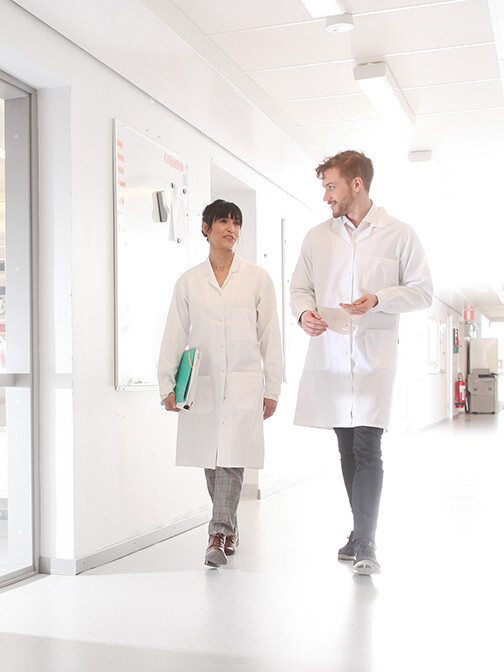 people-in-corridor-504x672